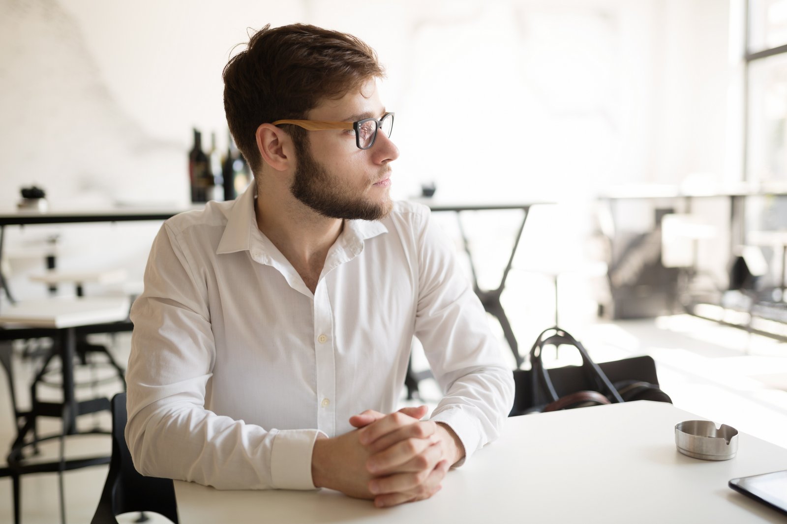 Worried businessman thinking on his coffee break